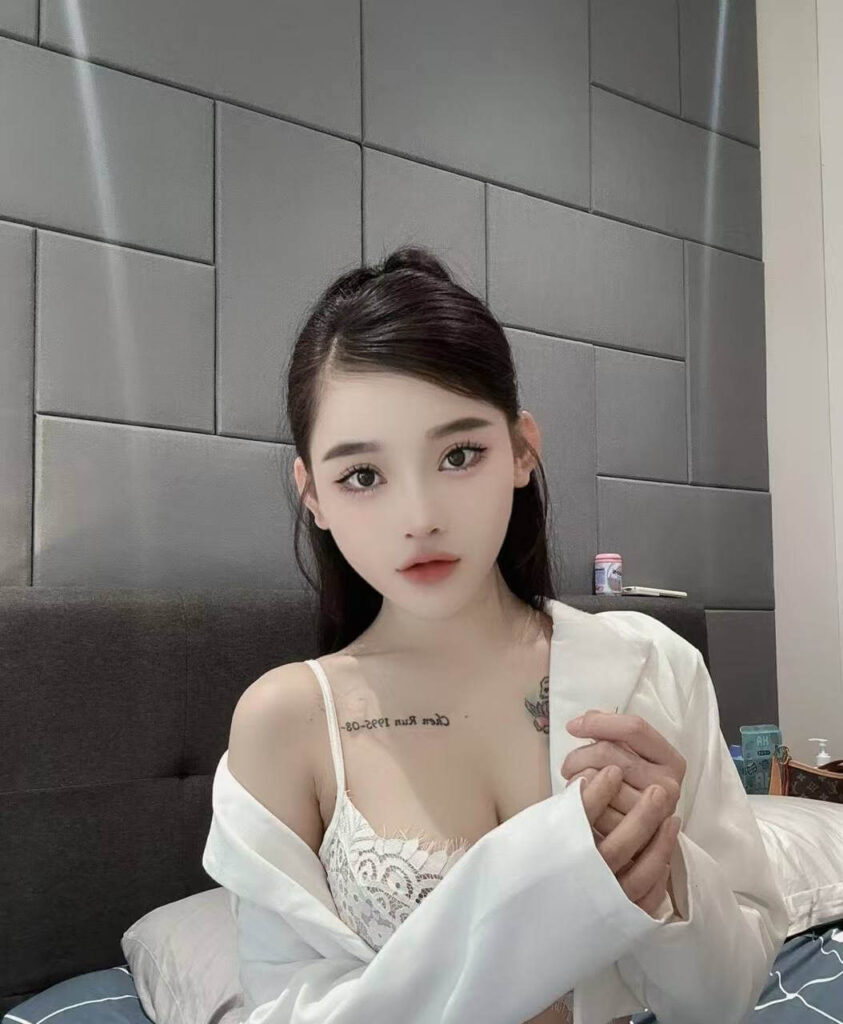 Guest Arriving To Singapore Hotel By Taxi At Night